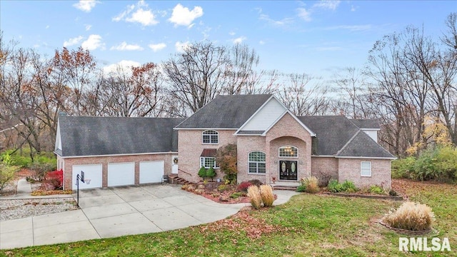 front of property featuring a garage