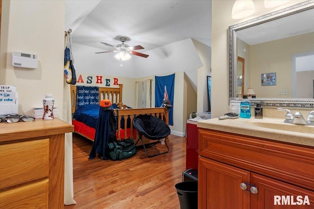 13599 Woodland Dr, Athens, IL 62613 - bedroom featuring light wood finished floors and a sink
