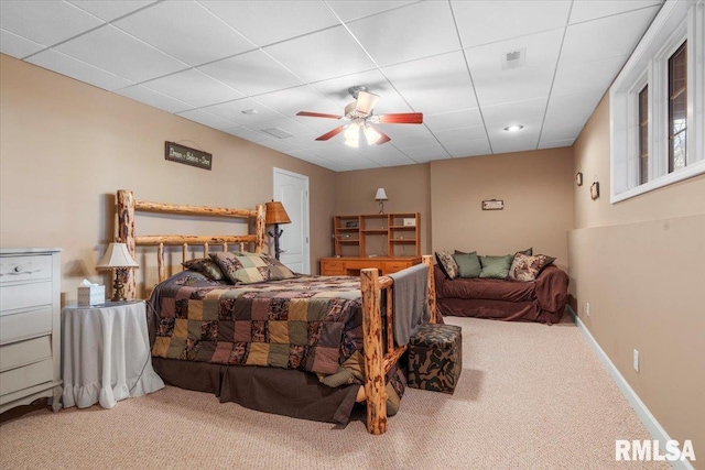 carpeted bedroom with ceiling fan