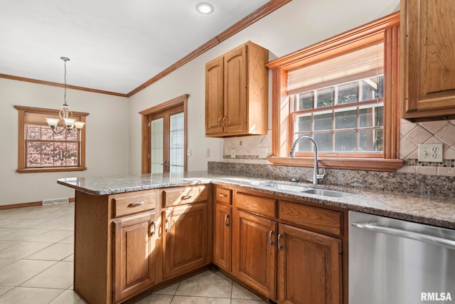 kitchen featuring kitchen peninsula, light tile patterned flooring, dishwasher, pendant lighting, and sink