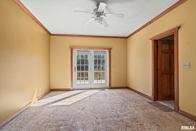 carpeted spare room with ceiling fan and ornamental molding