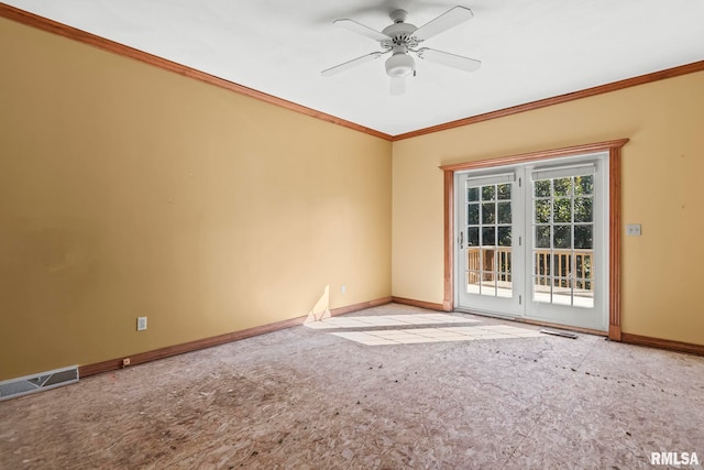 carpeted spare room featuring ceiling fan and ornamental molding