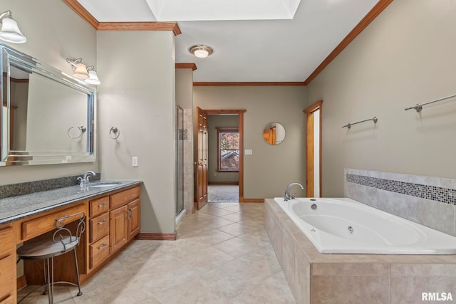 bathroom featuring a skylight, ornamental molding, shower with separate bathtub, and vanity