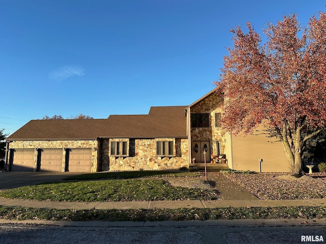 view of front of property featuring a garage