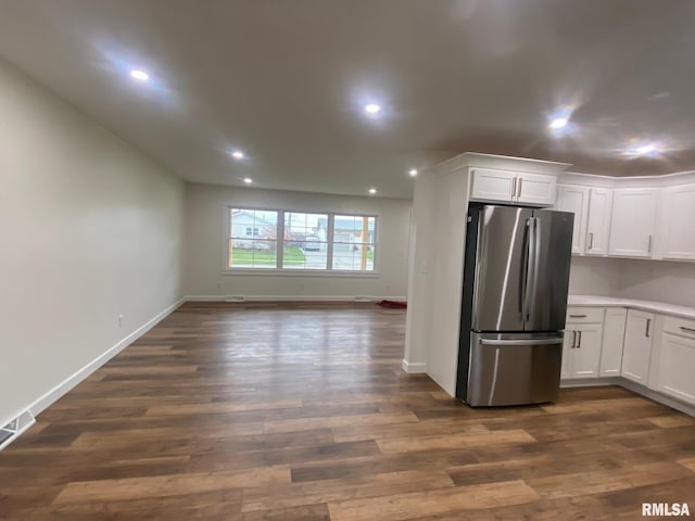 716 W Pauline St, Taylorville, IL 62568 - kitchen with freestanding refrigerator, recessed lighting, white cabinetry, open floor plan, and dark wood-type flooring