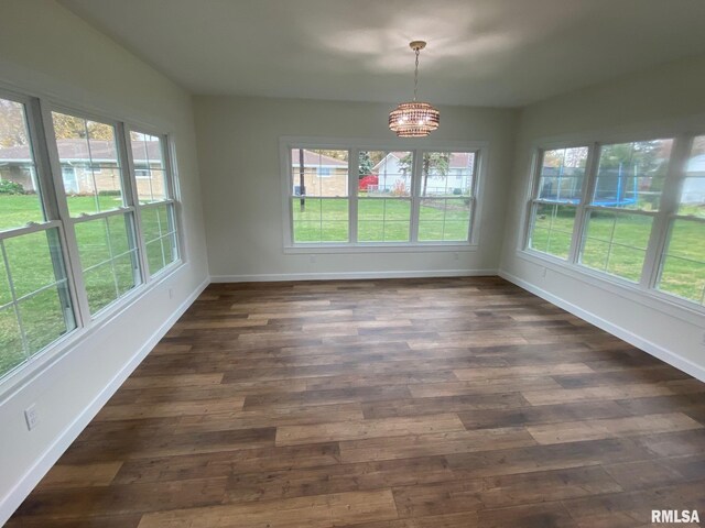 716 W Pauline St, Taylorville, IL 62568 - unfurnished sunroom featuring a chandelier