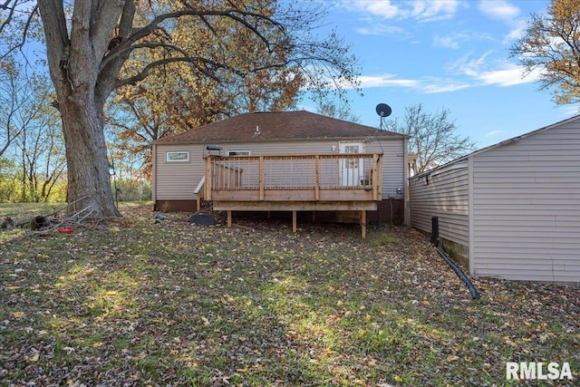 rear view of house with a deck