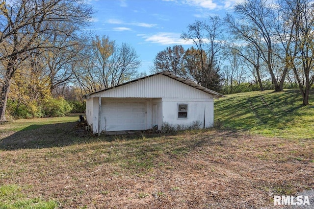 garage with a yard