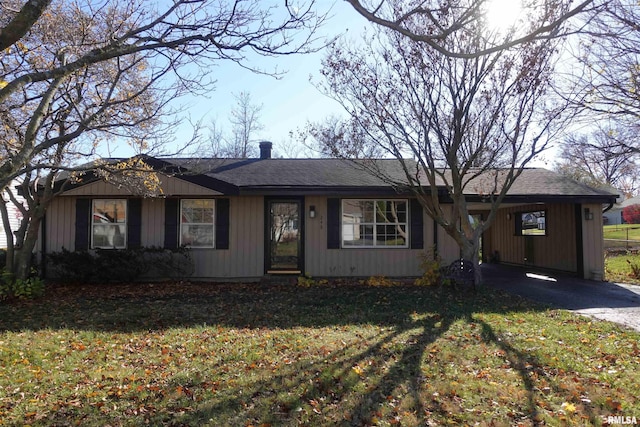248 W Sanborn St, Galesburg, IL 61401 - ranch-style home featuring a carport, asphalt driveway, roof with shingles, and a front yard