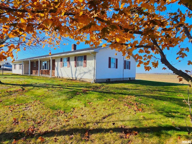 ranch-style house with a front yard