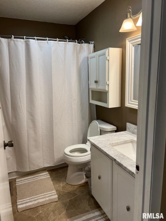 212 N Eastview St, Camp Point, IL 62320 - full bathroom with toilet, vanity, a textured ceiling, tile patterned floors, and curtained shower
