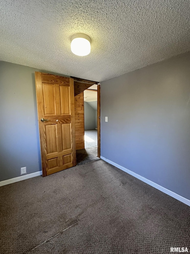 508 S Main St, Abingdon, IL 61410 - unfurnished bedroom featuring carpet floors, a textured ceiling, and baseboards