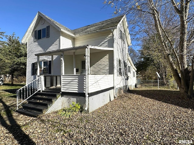 508 S Main St, Abingdon, IL 61410 - view of side of property featuring covered porch