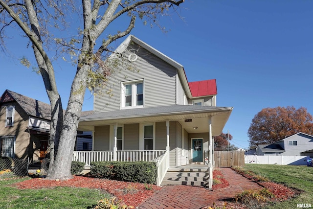 view of front of home featuring covered porch