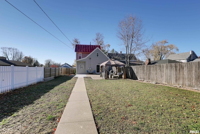 view of yard with a gazebo and a patio area