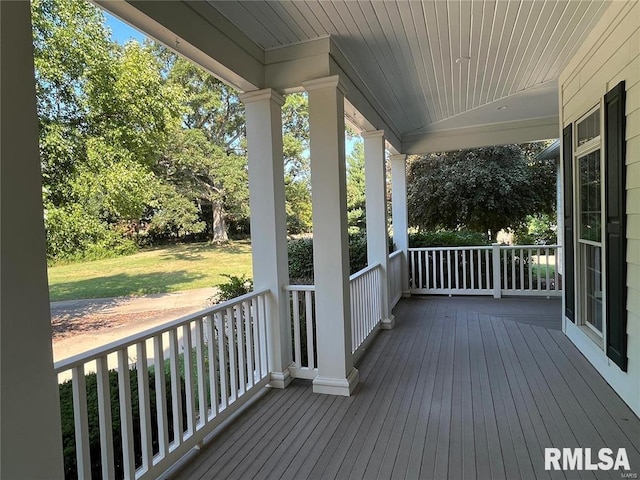 wooden terrace featuring a porch