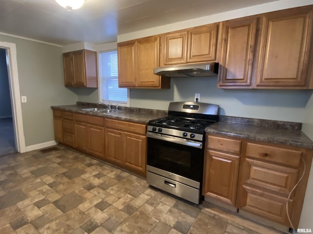 kitchen featuring sink and gas stove