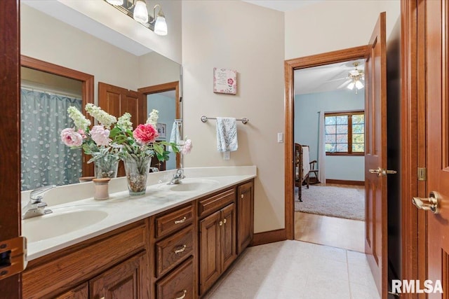 bathroom with tile patterned floors and vanity