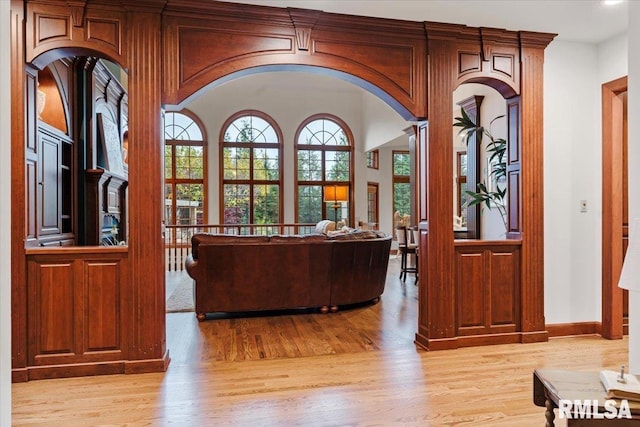 living room with light hardwood / wood-style flooring