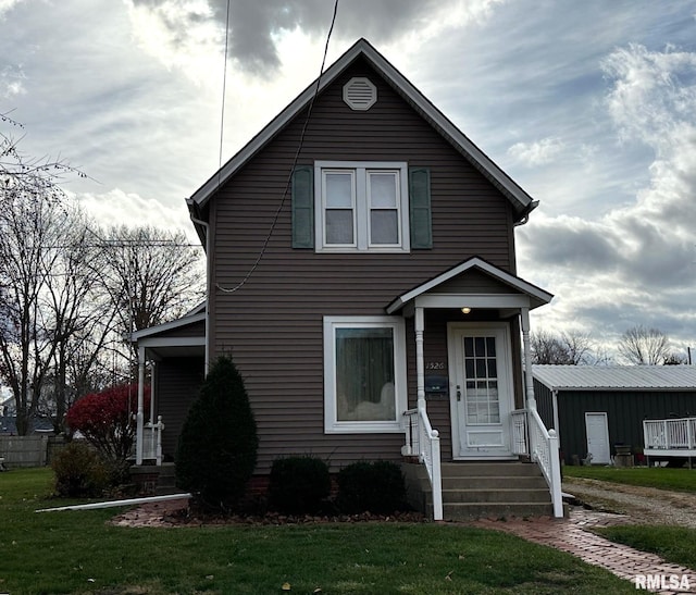 view of front of home with a front yard