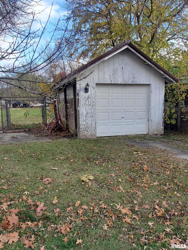 garage with a yard