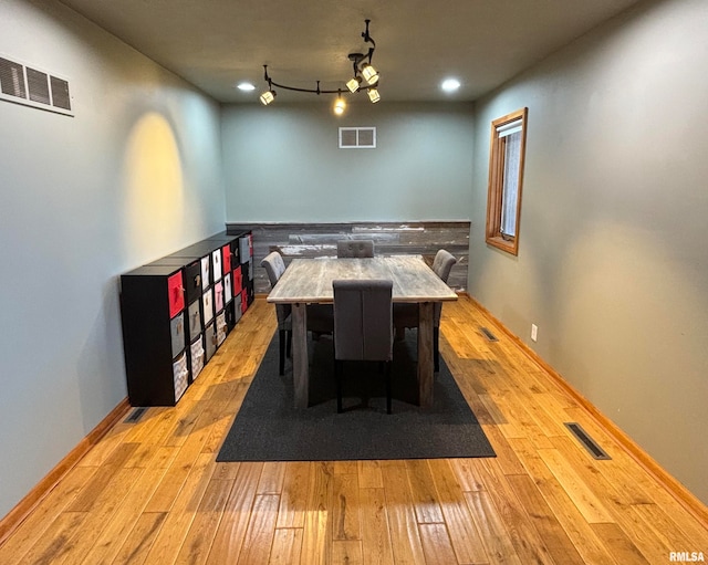 unfurnished dining area with light hardwood / wood-style flooring