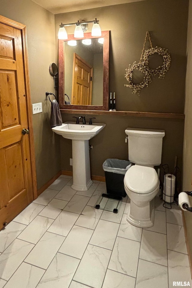 bathroom featuring toilet