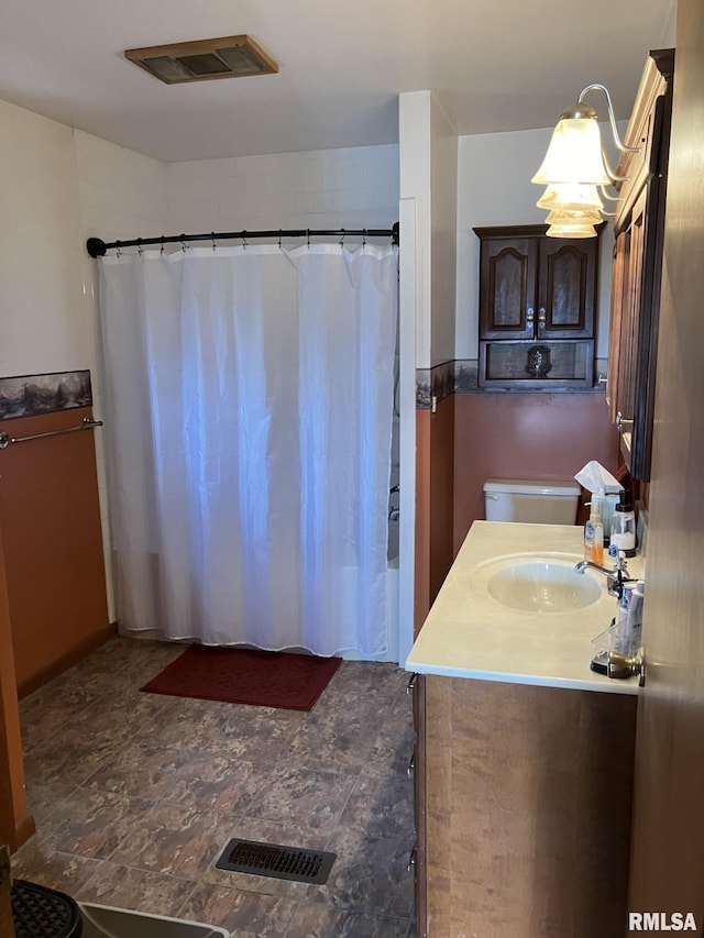 bathroom with vanity and walk in shower