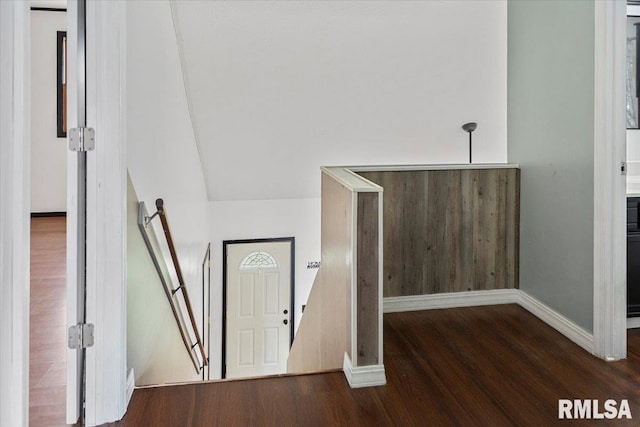 entryway with dark wood-type flooring