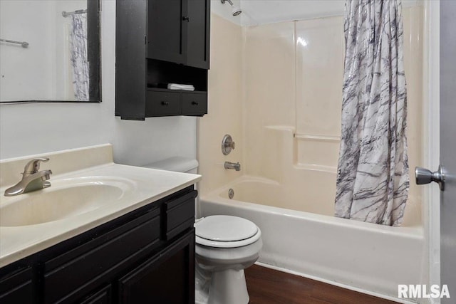 full bathroom featuring shower / bath combo, toilet, wood-type flooring, and vanity