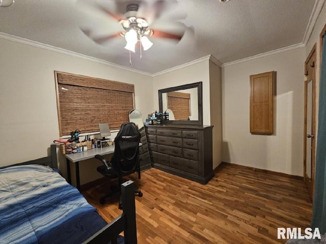 bedroom with a textured ceiling, crown molding, ceiling fan, and dark wood-type flooring