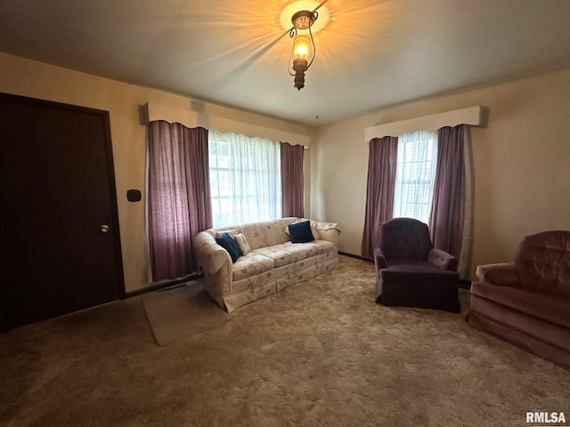 carpeted living room featuring a wealth of natural light