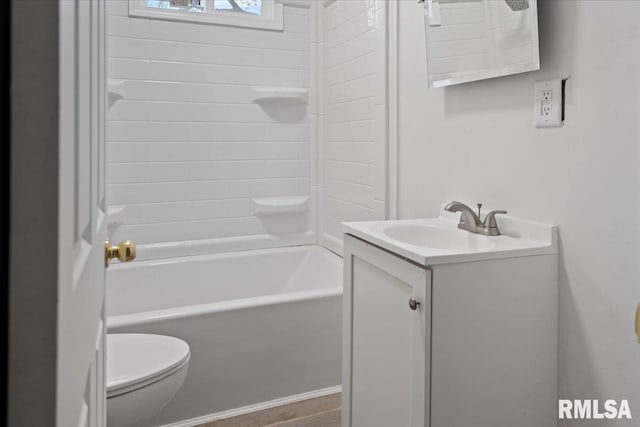 full bathroom featuring vanity, toilet, and tiled shower / bath combo