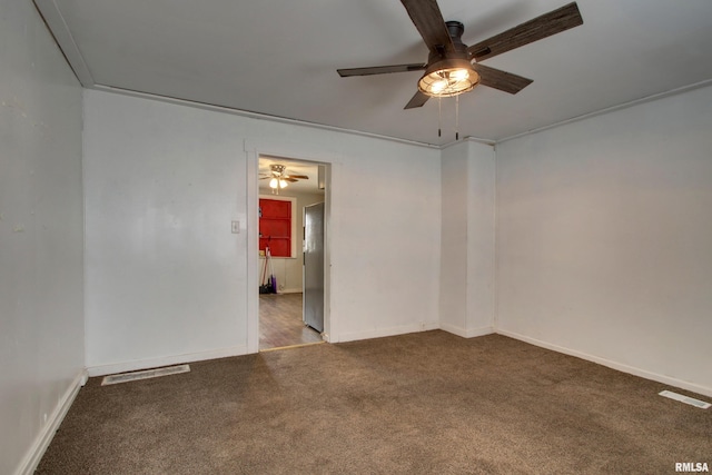 carpeted empty room with ceiling fan