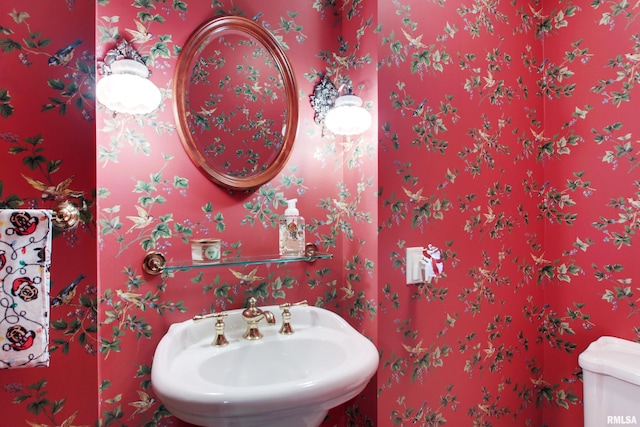 bathroom with sink and toilet