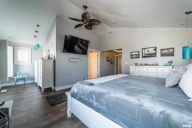 bedroom with ceiling fan, high vaulted ceiling, and dark wood-type flooring