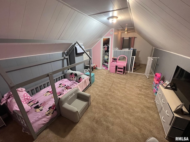 bedroom with carpet and lofted ceiling