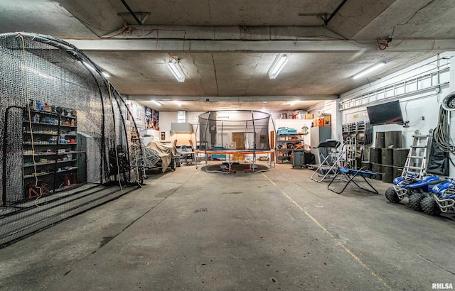 garage with a trampoline