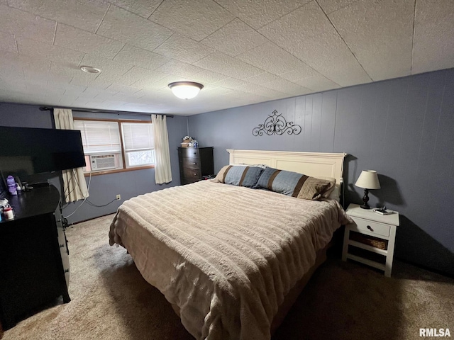 bedroom with carpet and cooling unit