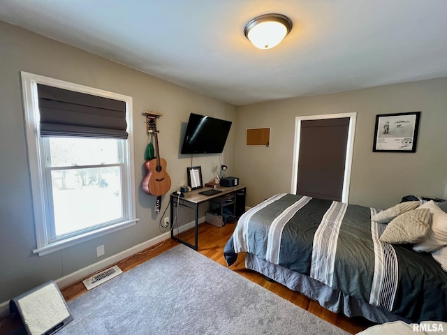 bedroom featuring hardwood / wood-style floors