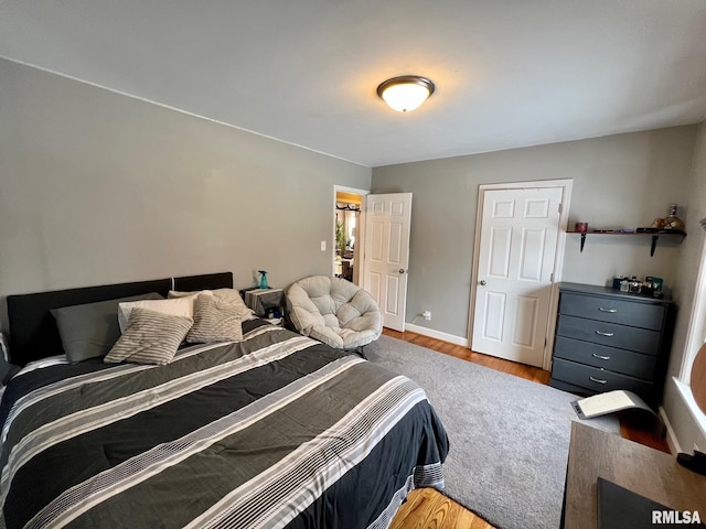 bedroom featuring hardwood / wood-style flooring