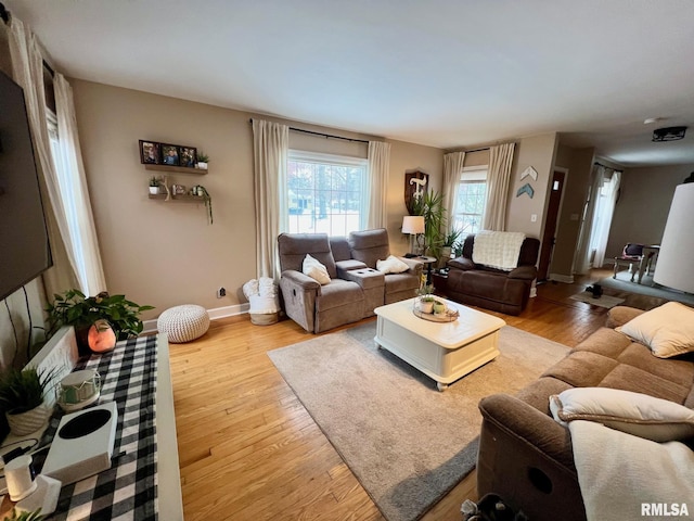 living room with light wood-type flooring