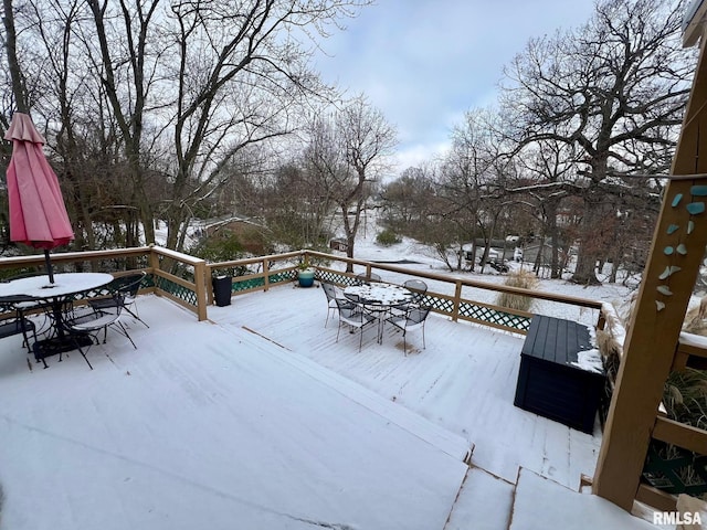 view of snow covered deck