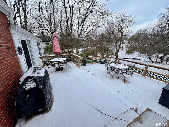 view of snow covered deck