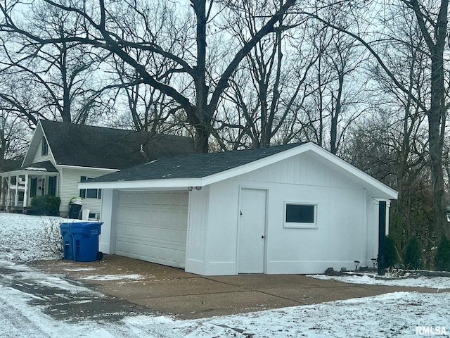 view of snow covered garage