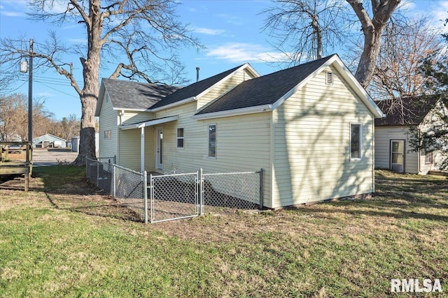 view of property exterior with a lawn