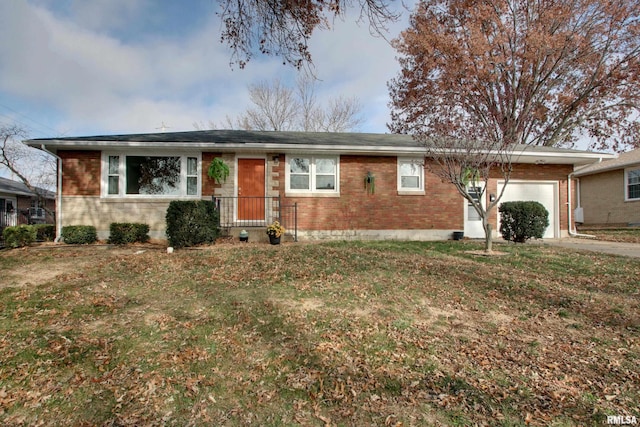 single story home featuring a front yard and a garage