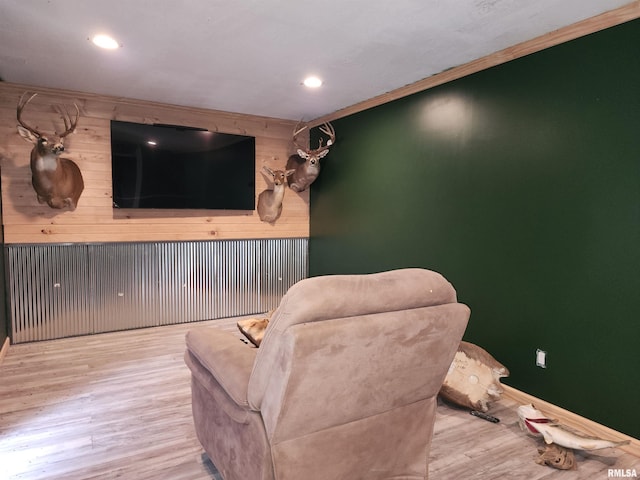 interior space featuring crown molding and light hardwood / wood-style floors