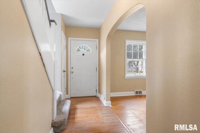 entryway with light hardwood / wood-style floors