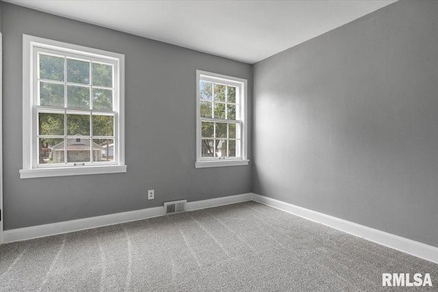 view of carpeted spare room